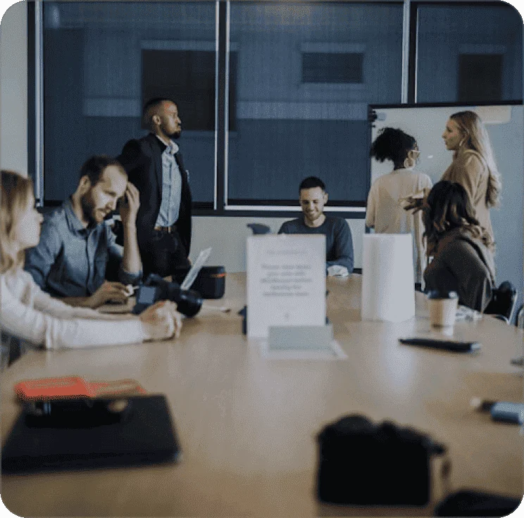 Marketing team in a meeting around a conference table