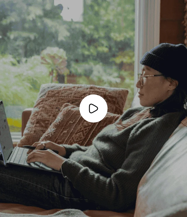 Woman working on a laptop at home, email marketing video thumbnail